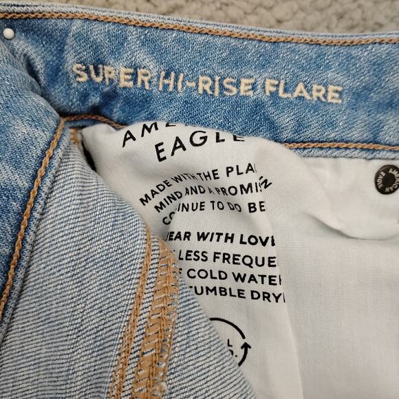 American Eagle Super Rise Flare Jeans Size 6 Light Blue Wash Distressed - Picture 8 of 10